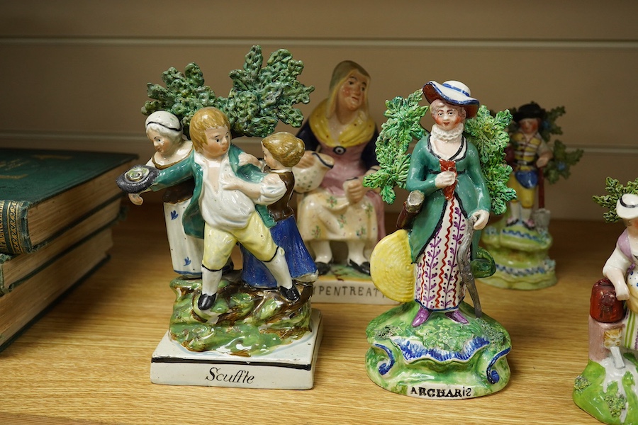 A group of nine Staffordshire pearlware figures and figure groups to include Scuffle and Dolly Pentreath, a dandy etc., largest 20cm high. Condition - some restoration